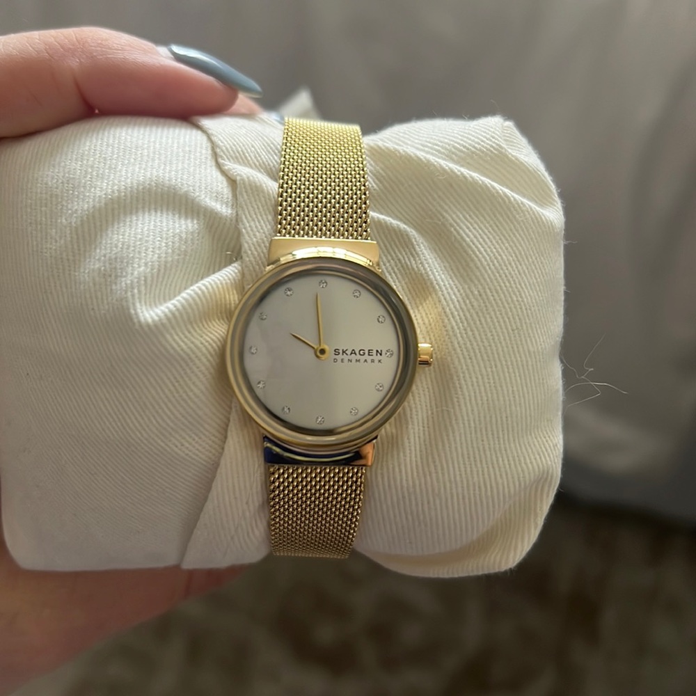Skagen women’s gold watch